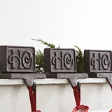 CTW Home Collection Set of Three Cast Iron 'Ho Ho Ho' Stocking Holders