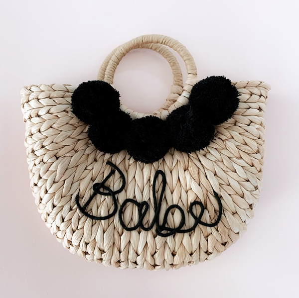 Event Blossom Crescent-Shaped 'Babe' Woven Straw Purse with Pom Poms